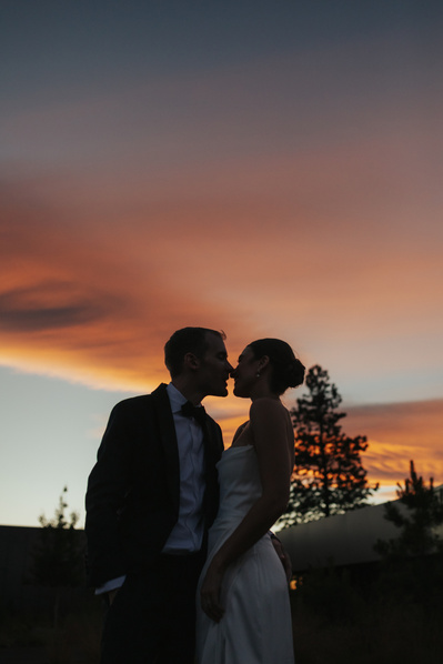 Bride and groom photo at sunset 