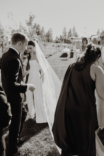 Candid photo of the bride and her veil. 