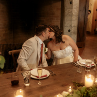 Bride and groom kissing photo at Brasada Ranch wedding reception in Oregon
