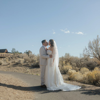 Bride and Groom portrait of them kissing at Brasada Ranch
