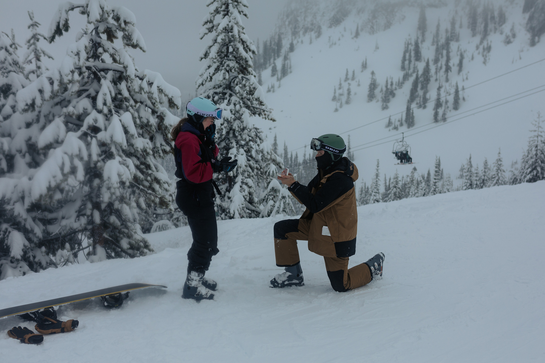 Proposing while skiing and snowboarding on the mountain at Hoodoo in Oregon