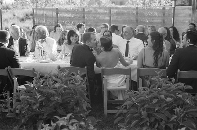 film photo of bride and groom kissing during their wedding reception in Oregon