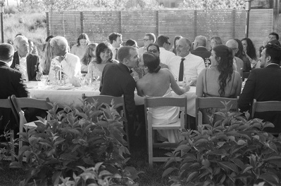 film photo of bride and groom kissing during their wedding reception in Oregon