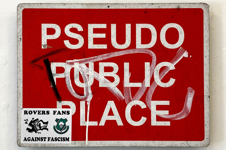 Pseudo Public Place Sign Tagged at Alaric Hobbs Centrespace Gallery Exhibition '(Host)ile', in Bristol, England.