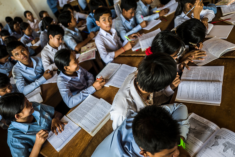 Students in class at Borkeo Lower secondary school -Laminh commune - Borkeo district, Ratanakiri Province Cambodia. The school offers a boarding facility for children who's families live in rural communities making access to school difficult.