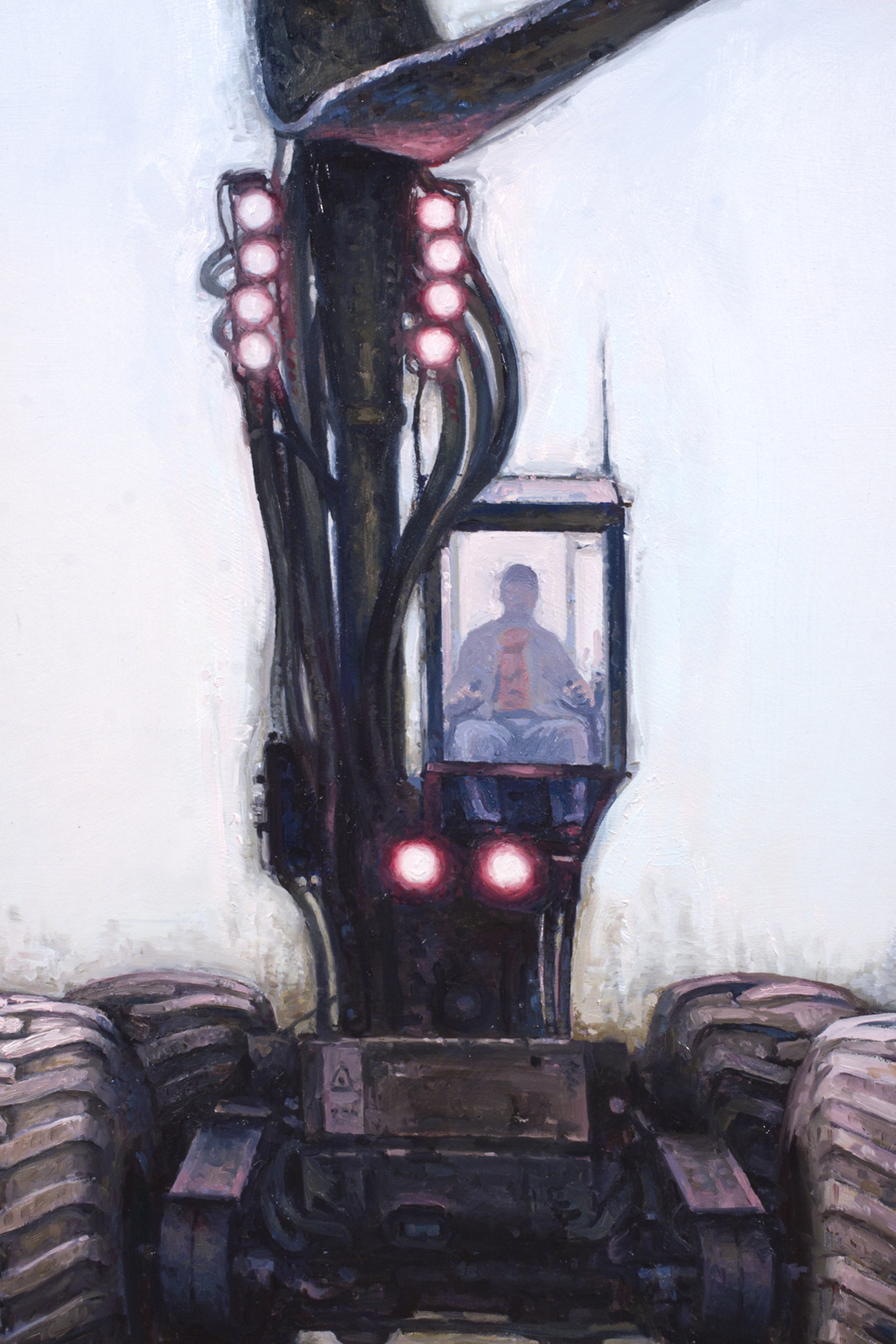 Monstrous machine used to grab and sever large tree trunks, raising its "claws" to the sky. In a small, glass booth the diminutive driver is at the controls, detail