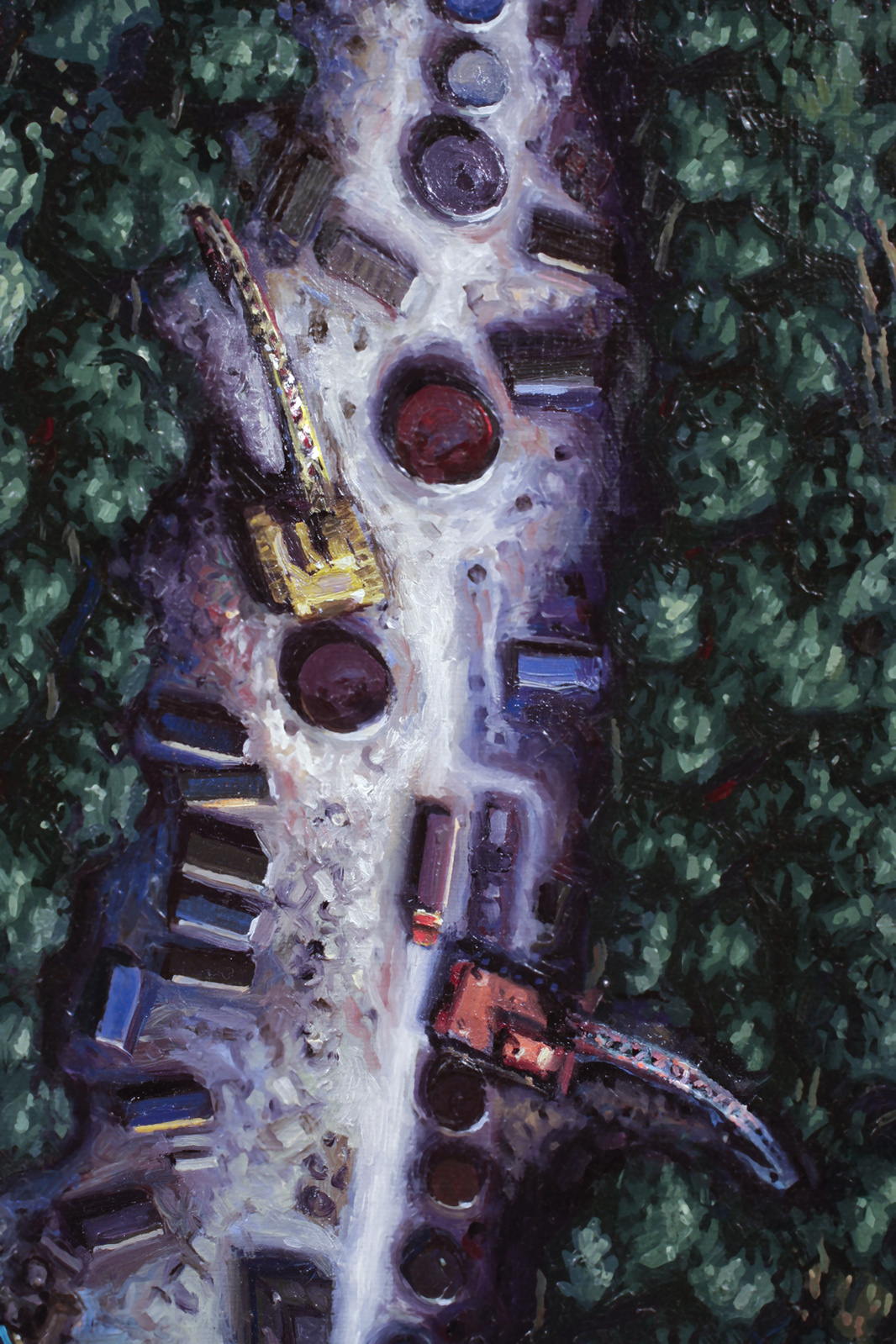 A dense forest penetrated in 3 areas (red, yellow and blue) by excavators, storage tanks, buildings.