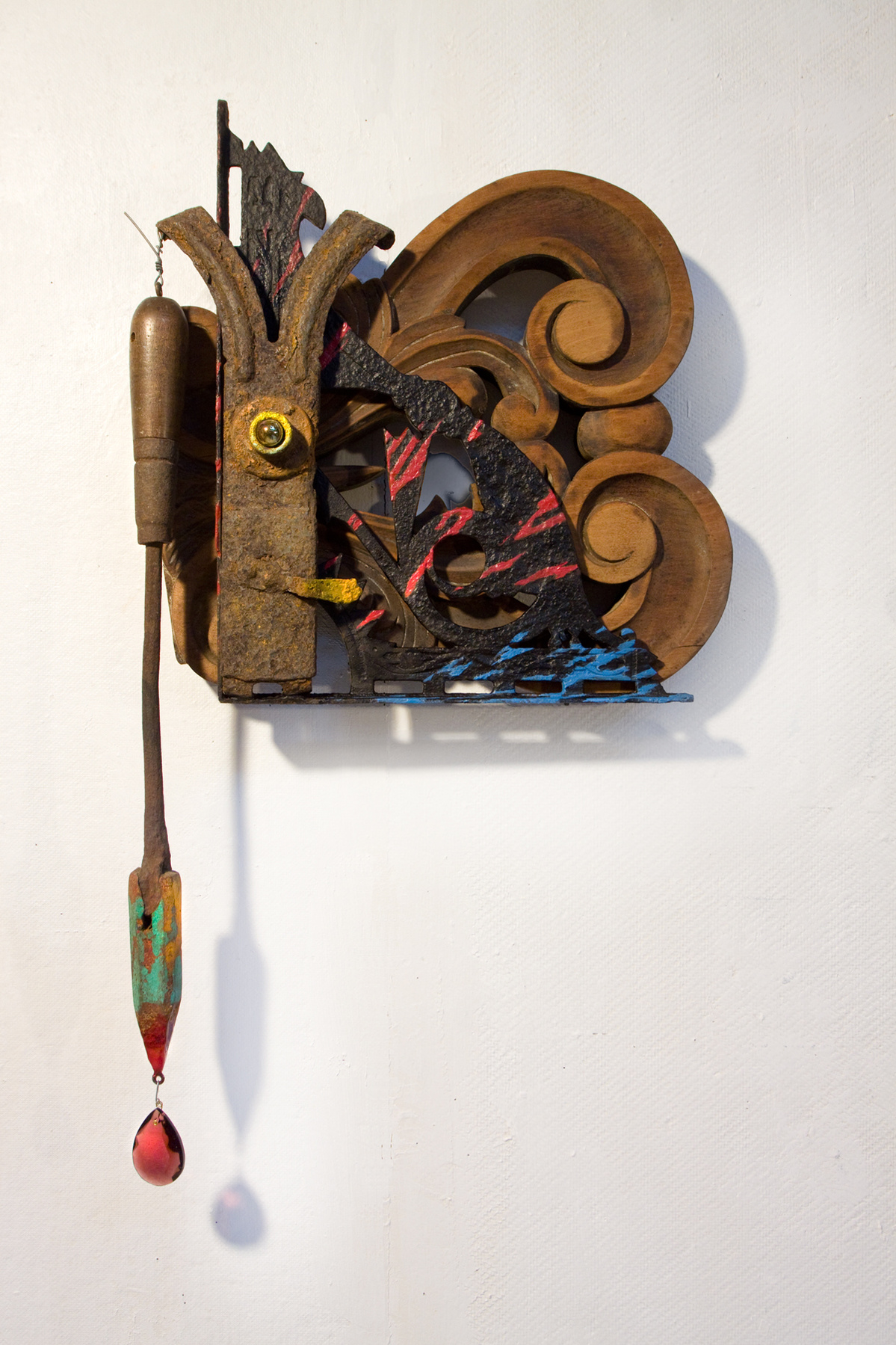 Wall assemblage referencing passion and conflict.