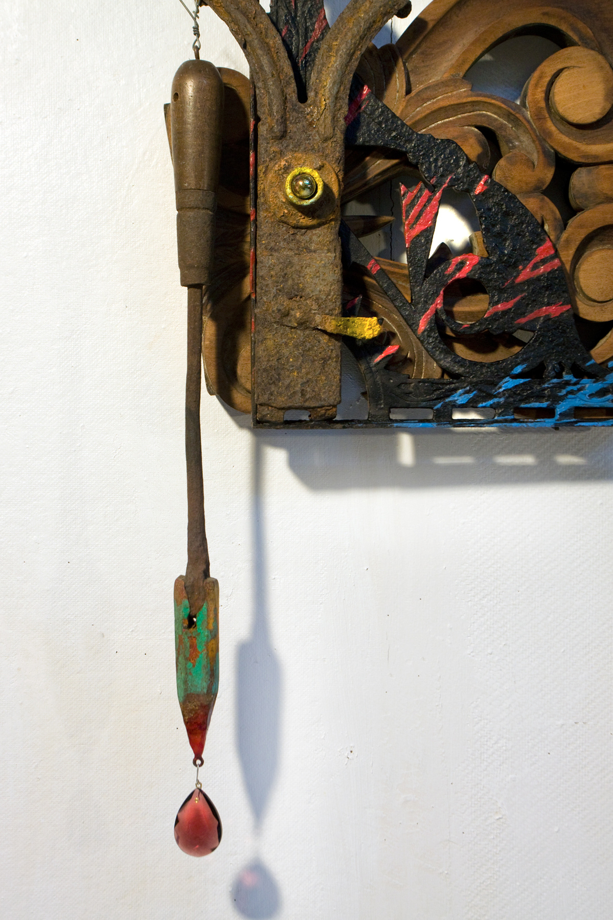 Wall assemblage referencing passion and conflict. Detail