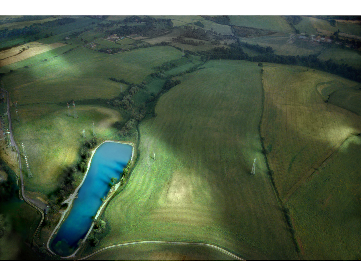 Roman countryside: Green landscape, reservoir with sunspot