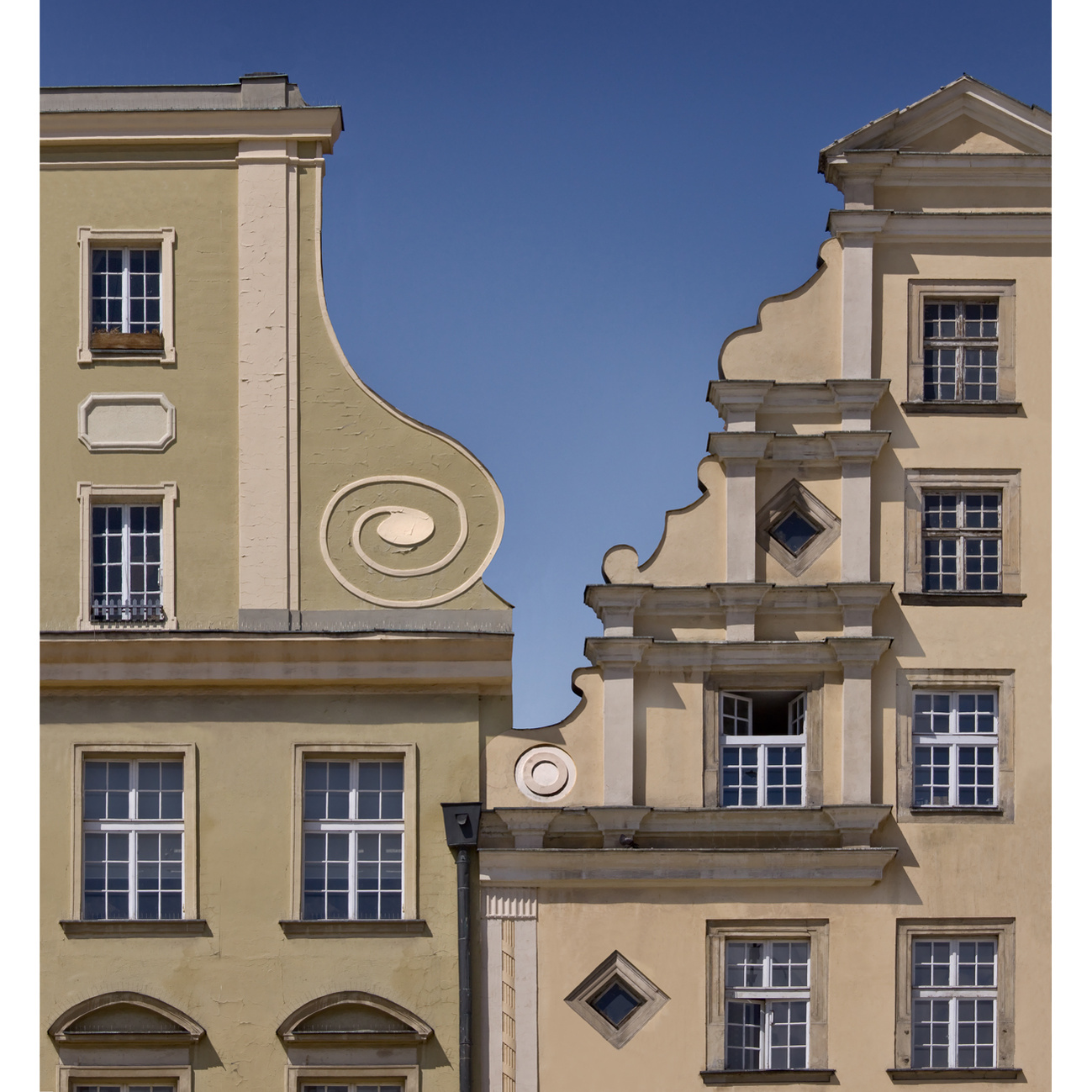 Graduated sky seen between adjacent Baroque gables, Wroclaw, Poland