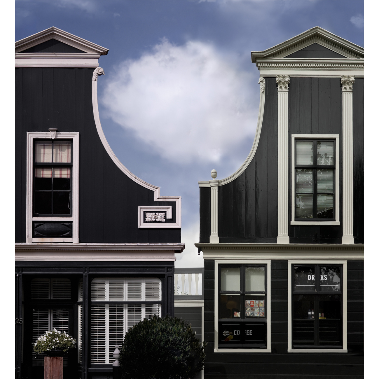 Cloud seen between adjacent Baroque gables, near Amsterdam