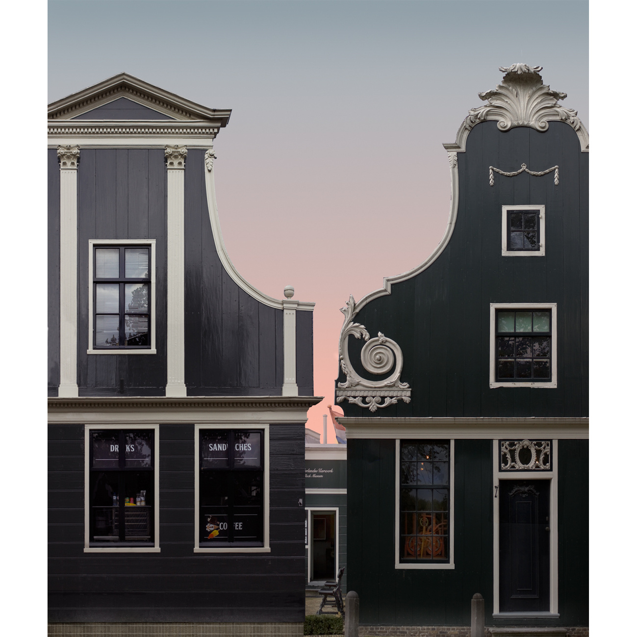 Graduated sky seen between adjacent Baroque gables, near Amsterdam