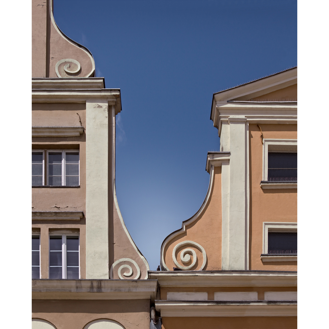 Graduated sky seen between adjacent Baroque gables, Wroclaw, Poland