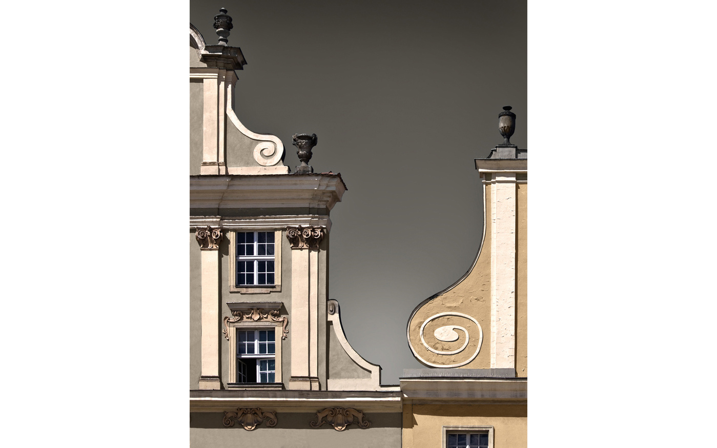 Graduated sky seen between adjacent Baroque gables, Wroclaw, Poland. Reduced color.