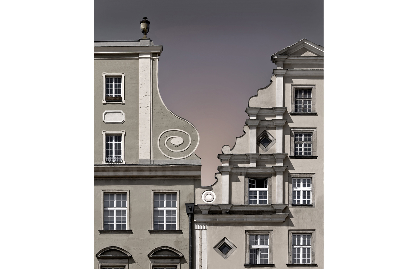 Graduated sky seen between adjacent Baroque gables, Wroclaw, Poland. Reduced color.