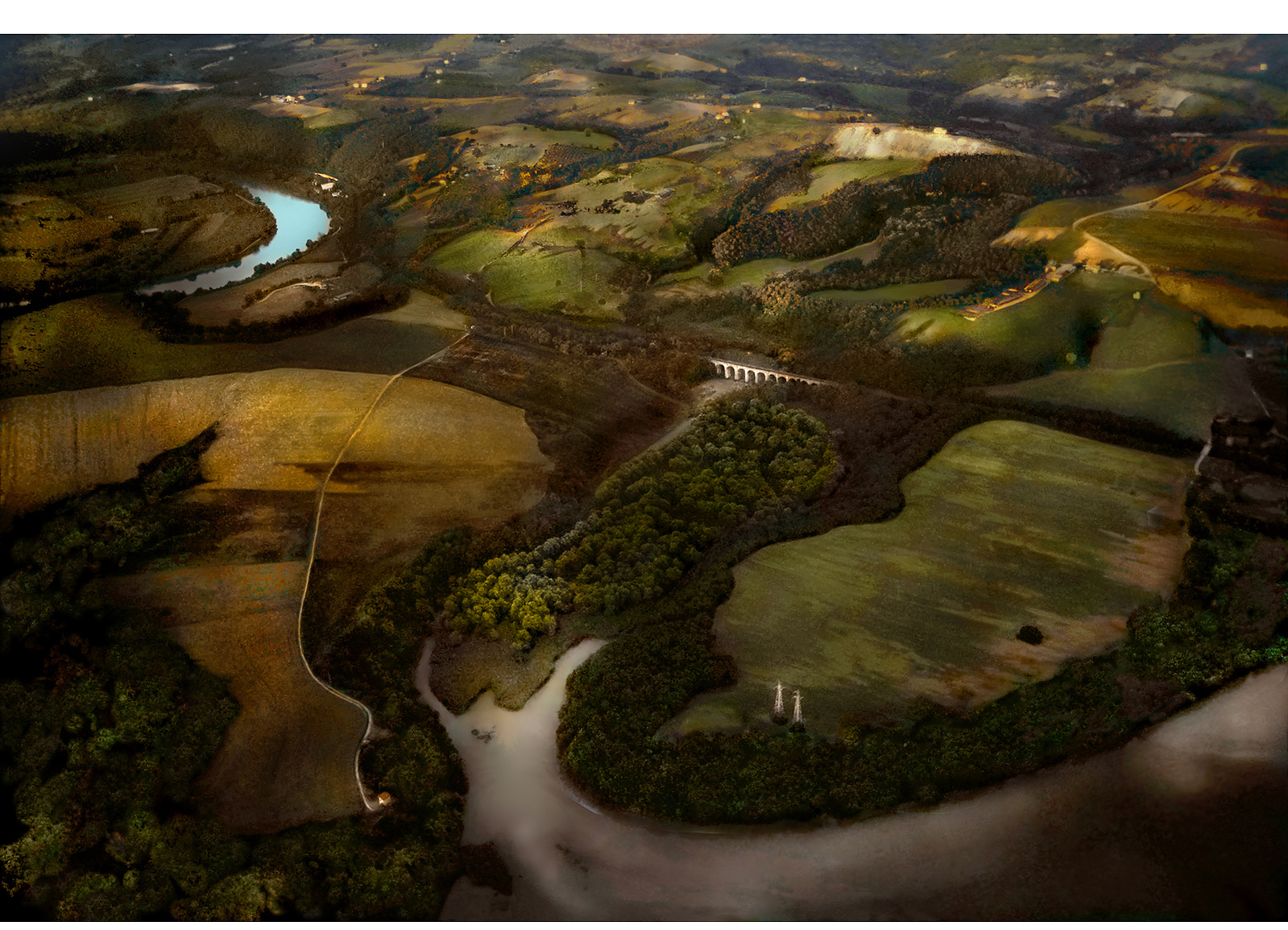 Roman countryside: Verdant and cultivated hills and valleys, with a glimpse of the Tiber River, north of Rome