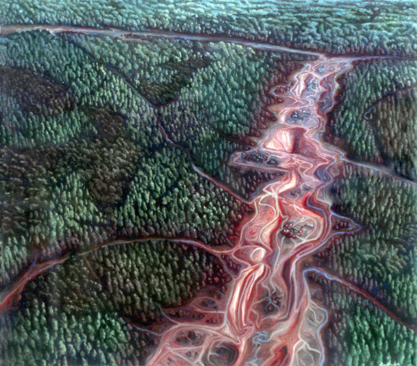 Aerial view of a strip mine, in flesh-like colors, in a dense forest.