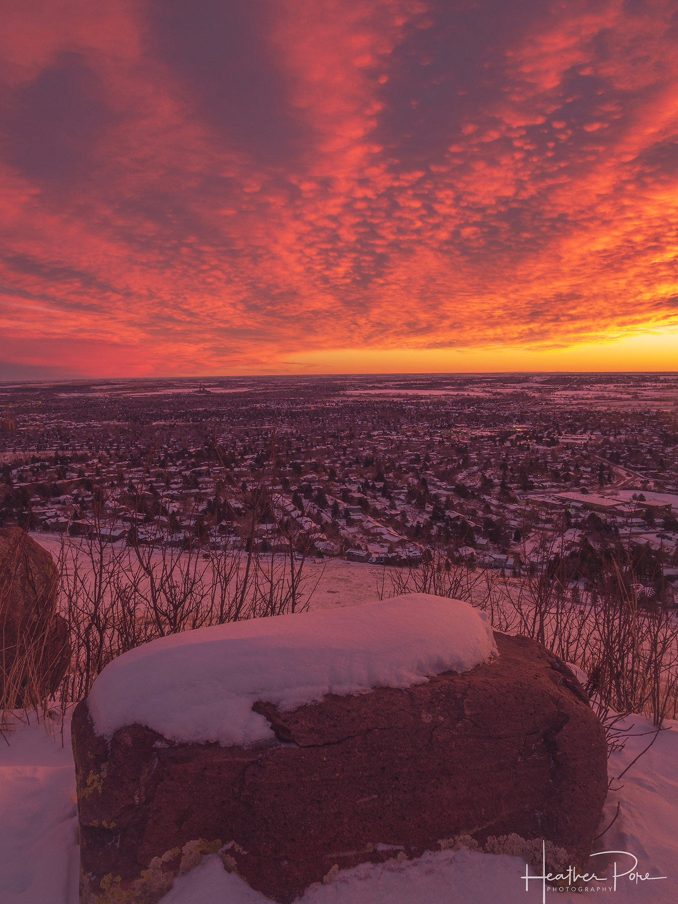 winter sunrise photography over boulder, colorado, snowy landscape, blanket of pink and purple clouds, landscape photography