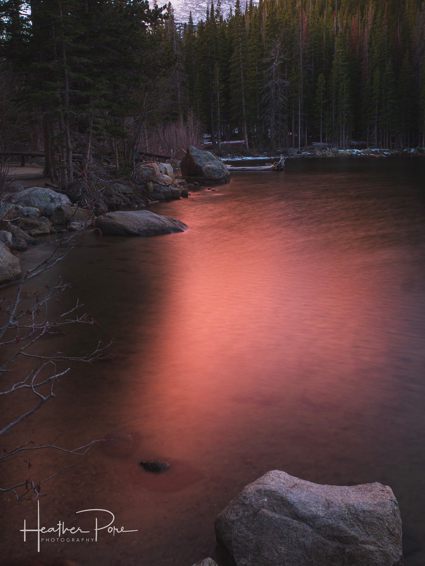 Long exposure photograph of sunrise reflecting in Bear Lake