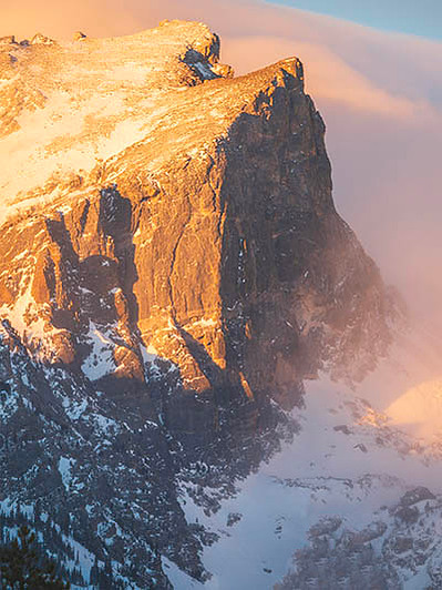 close up of Hallett Peak during morning golden hour, rocky mountain national park, how to take sunrise photos