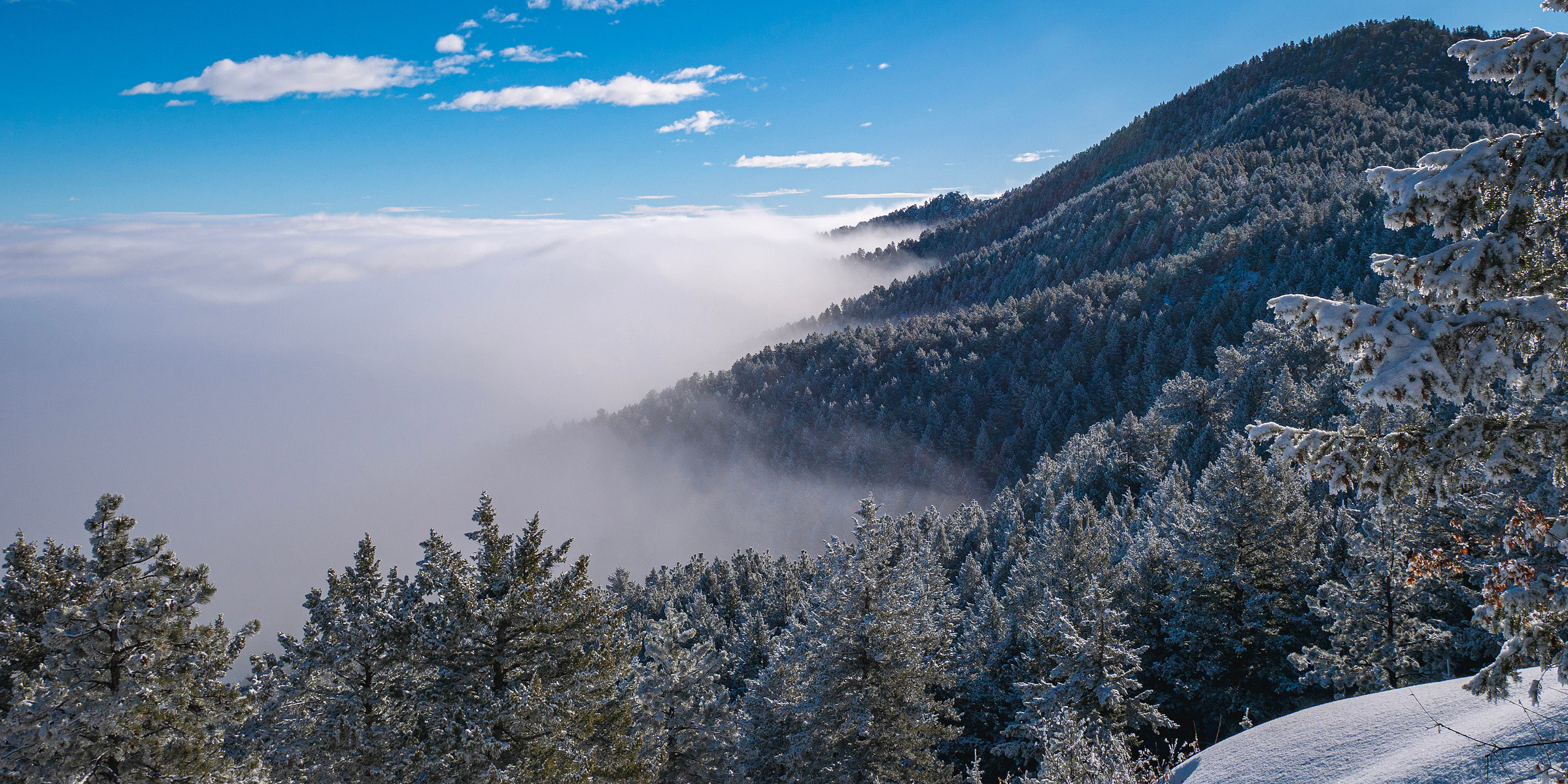 Landscape photograph of a cloud inversion over  Boulder, Colorado from Green Mountain West Ridge Trail