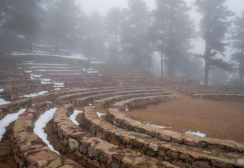 a picture of sunrise circle at sunrise amphitheater in boulder, colorado on a foggy late winter morning.