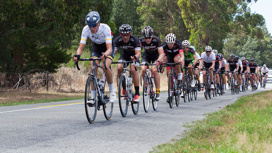 Peleton chasing breakaway on a quiet road