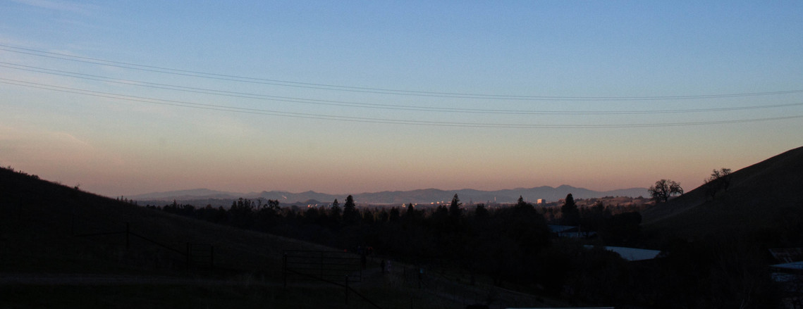 A distant view of Walnut Creek at sunset 