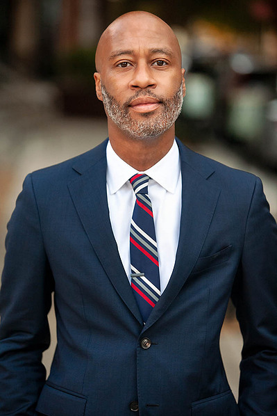 Gentlemen posing for his online dating headshots.