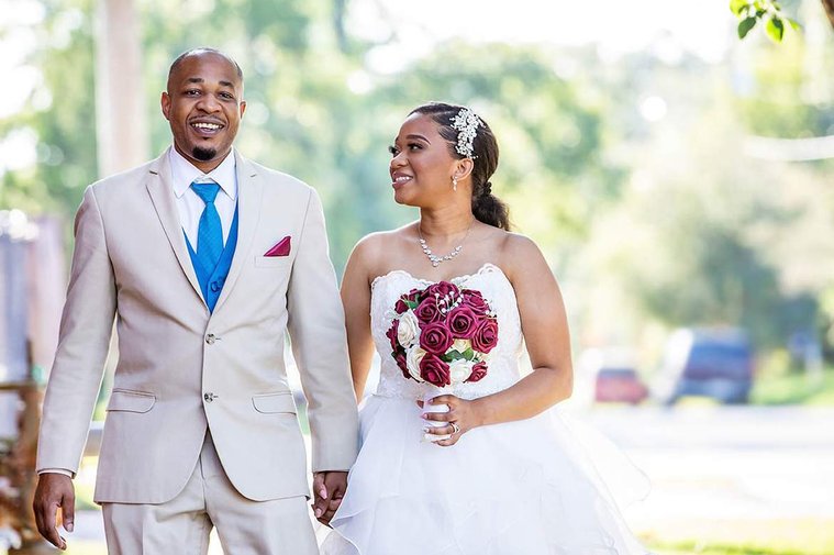 Photographing a wedding with their Atlanta wedding photographers.
