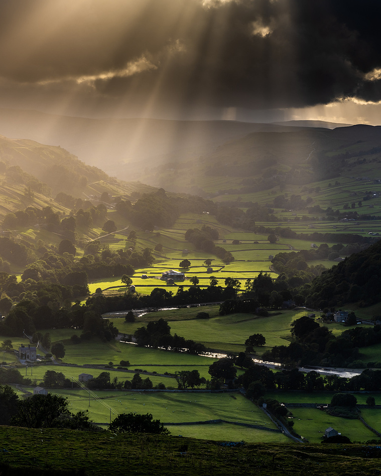 Swaledale valley lit by the sun's evening rays