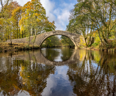 A pack horse bridge across the river Swale in Swaledale, Yorkshire Dales