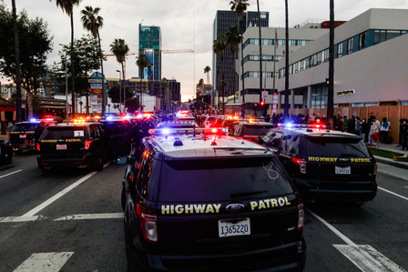 Dozens of police vehicles fill an entire block of Sunset Boulevard as LAPD officers arrest over 100 protesters Monday, June 1, 2020.