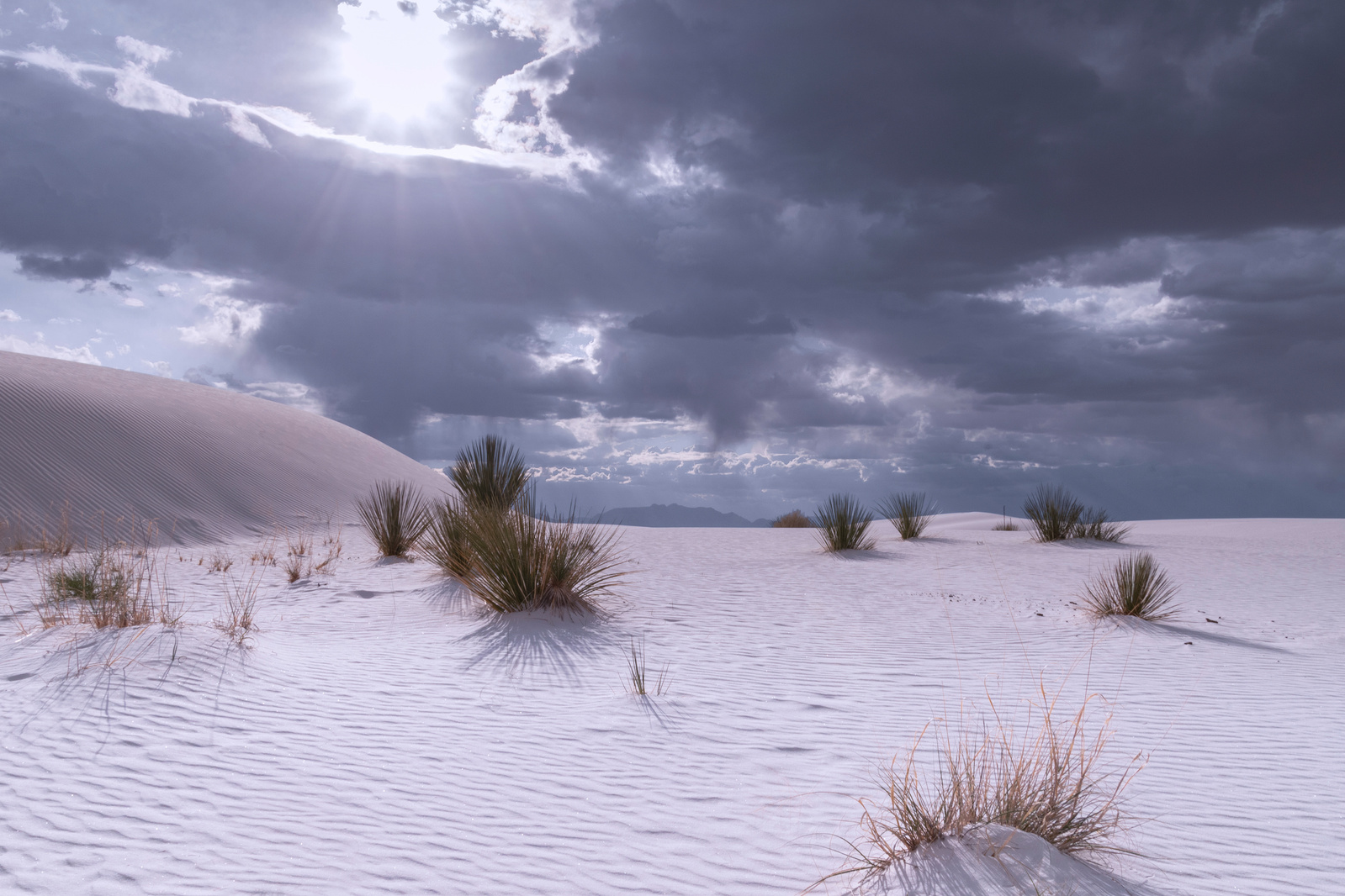 White sand dunes and clouds in White Sands National Park, New Mexico