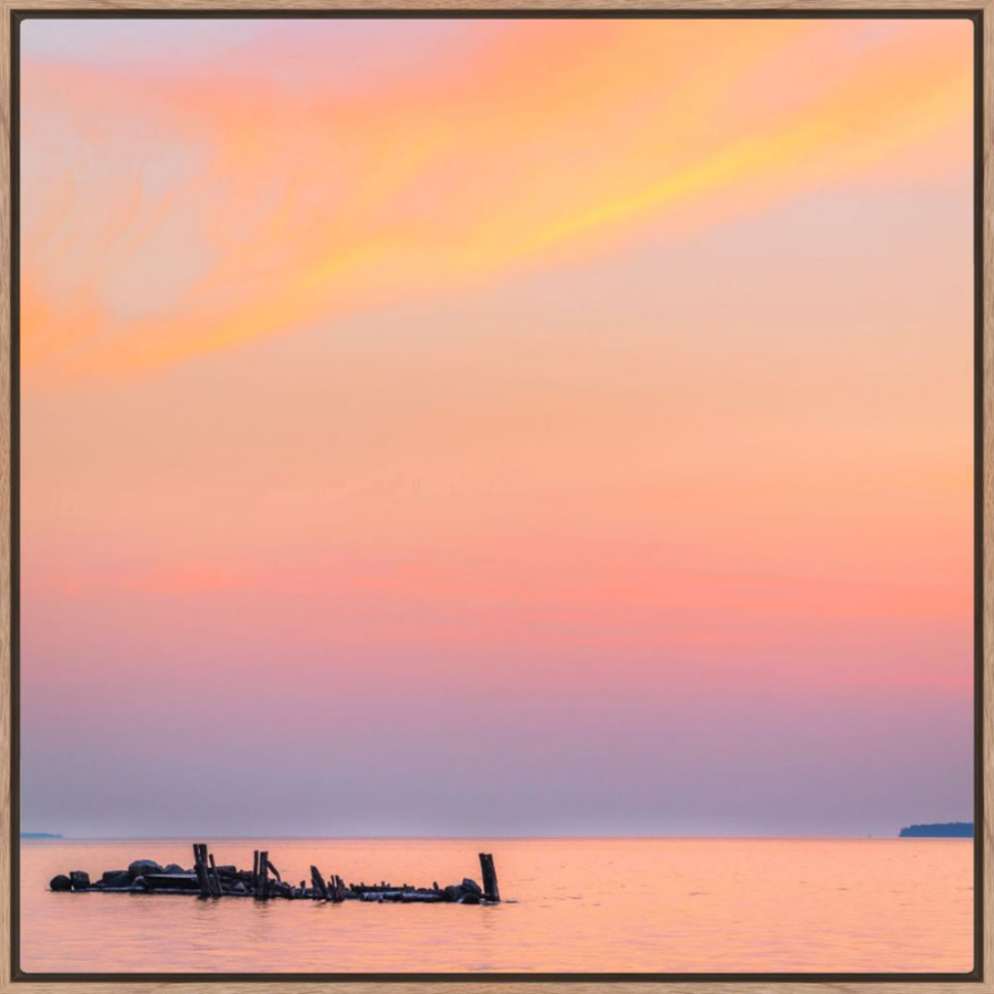 Vibrant color clouds at sunset over Lake Superior along the Apostle Islands National Lakeshore in Northern Wisconsin 