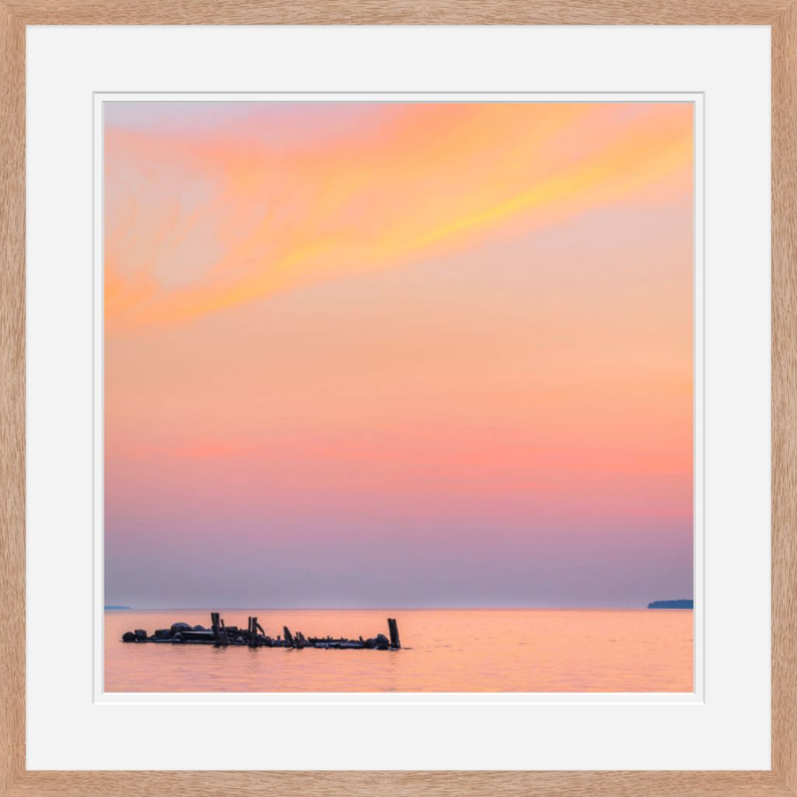 Vibrant color clouds at sunset over Lake Superior along the Apostle Islands National Lakeshore in Northern Wisconsin 