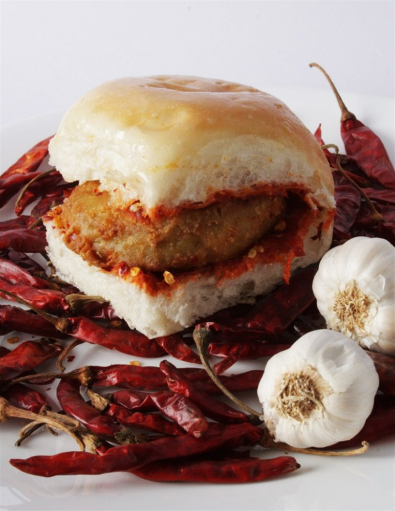 Food photo of Schezwan Vada Pav shot in Bombay
