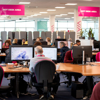Corporate business portraits & lifestyle images of open plan office taken in the workplace for company website www.1image.ie