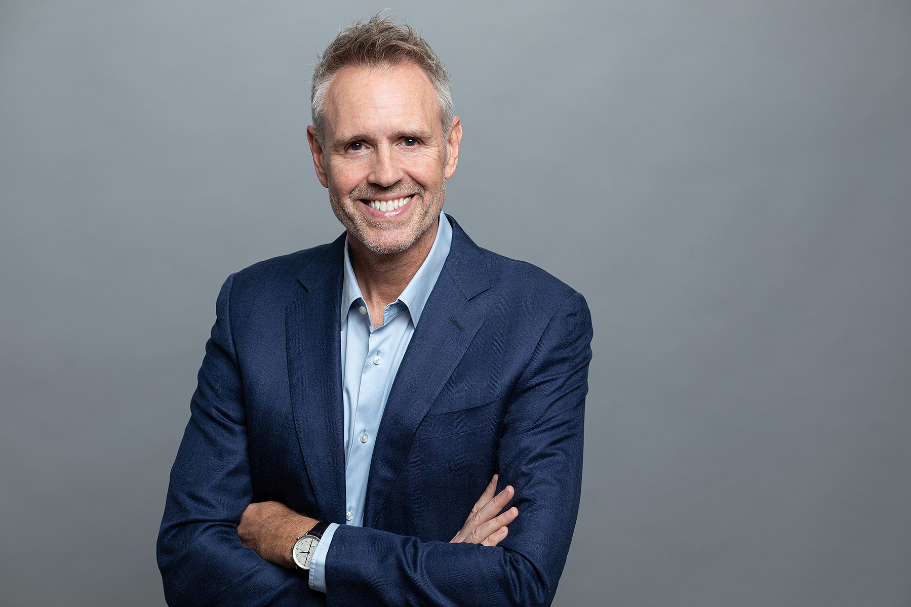 Professional studio headshot of male business professional, grey background. Corporate Headshot & Business Portrait Photographer, Dublin
