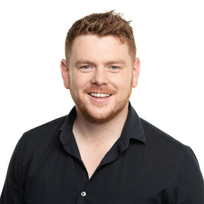 Professional LinkedIn Headshot of  young male in black shirt white background photography studio 