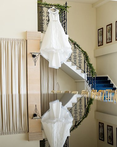 Whittlebury Park Wedding Dress Hanging on Banister