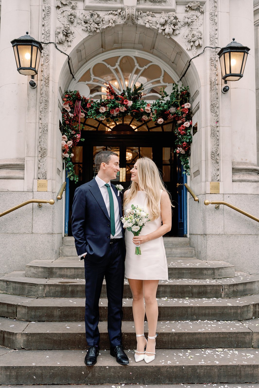 Chelsea Old Town Hall Wedding bride and groom on steps