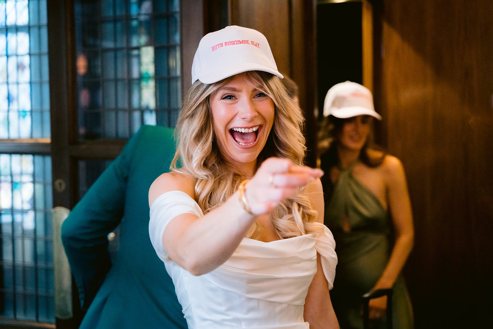The Old Marylebone Town Hall Wedding Ruth Buscombe in Baseball Cap at The Ivy