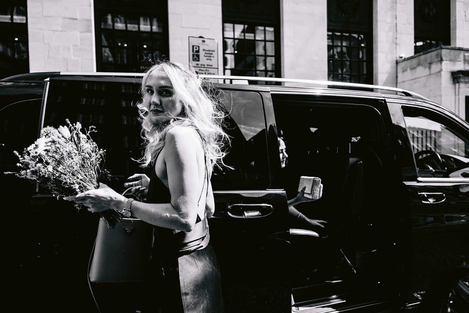 The Old Marylebone Town Hall Wedding Bridesmaid Exiting Minivan