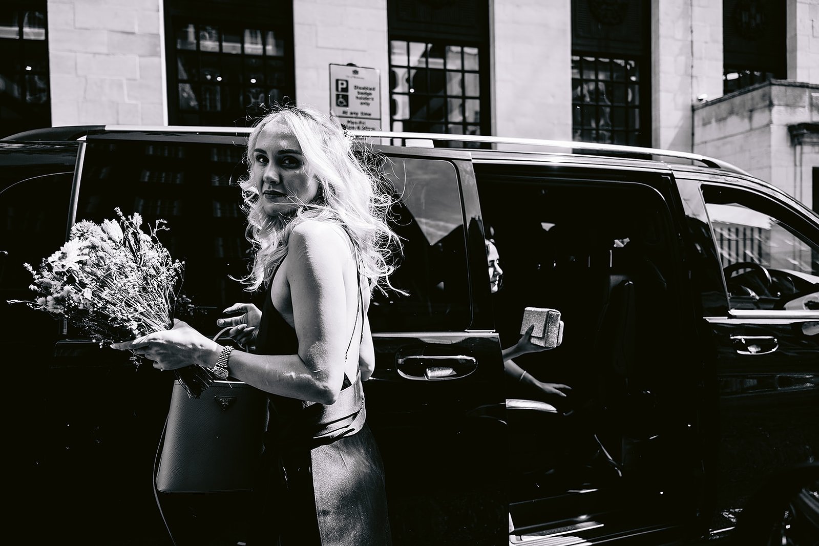 The Old Marylebone Town Hall Wedding Bridesmaid Exiting Minivan