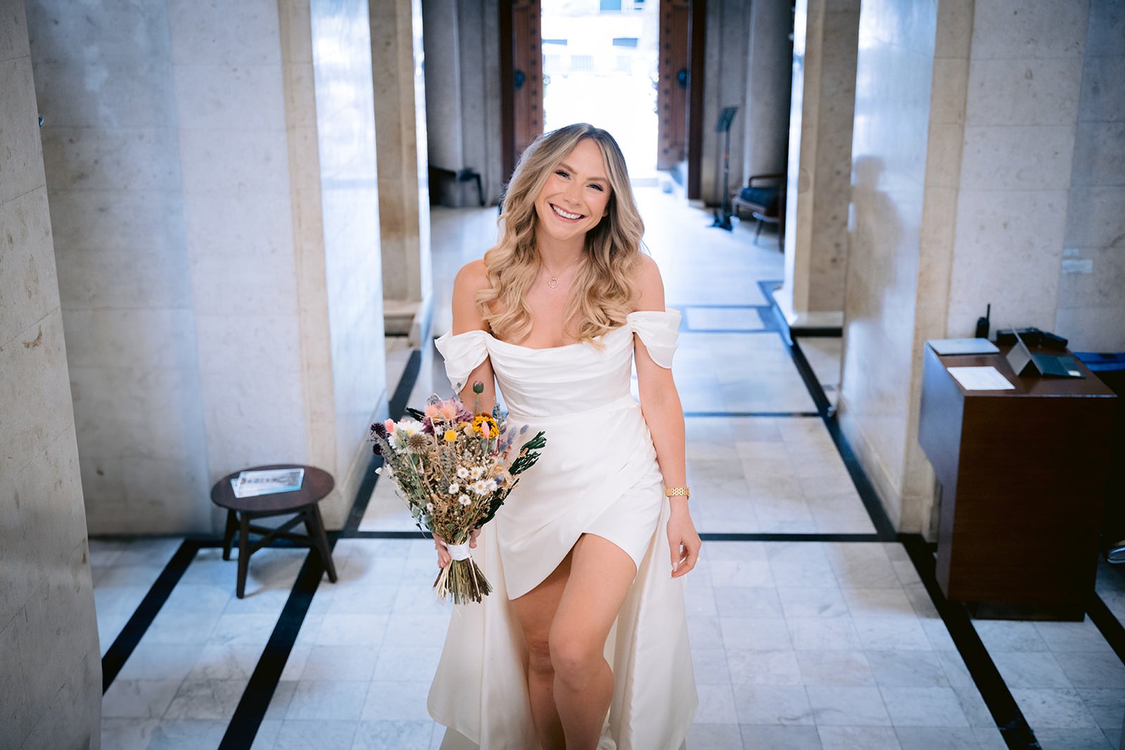 The Old Marylebone Town Hall Wedding Ruth Buscombe on Steps inside the hall