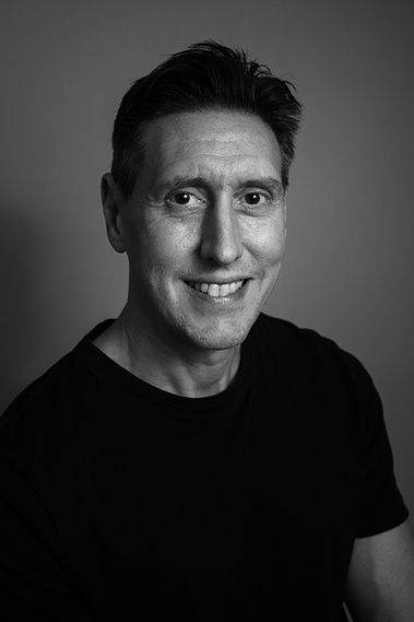 Headshot of Gino Zisa, London Editorial Wedding Photographer