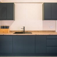 Ultra Sharp Studios mezzanine blue kitchen