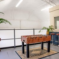 Ultra Sharp Films breakout area with table football.
